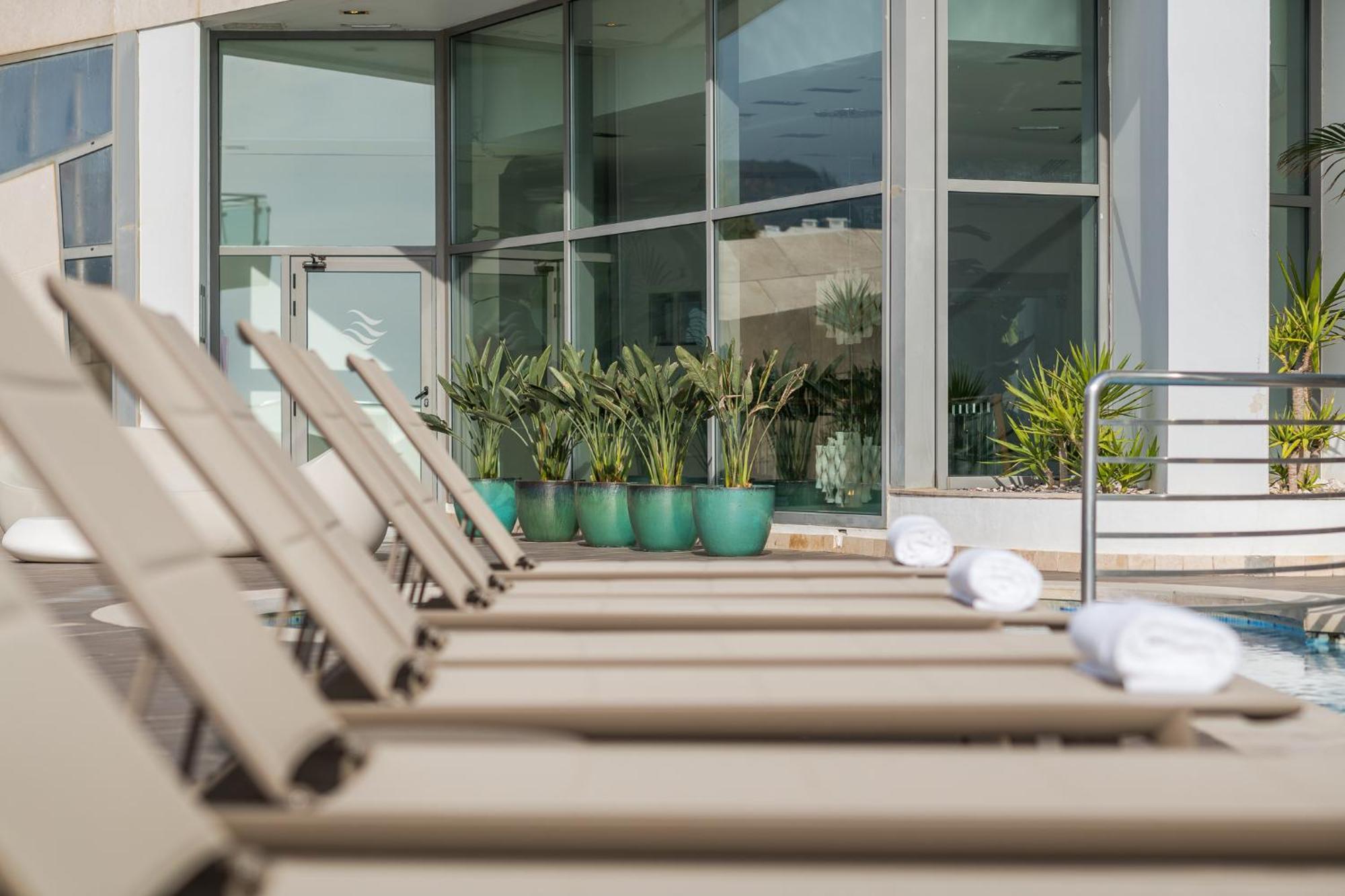 Sesimbra Hotel&Spa Exterior foto The pool at the Ritz-Carlton, Downtown, Dubai